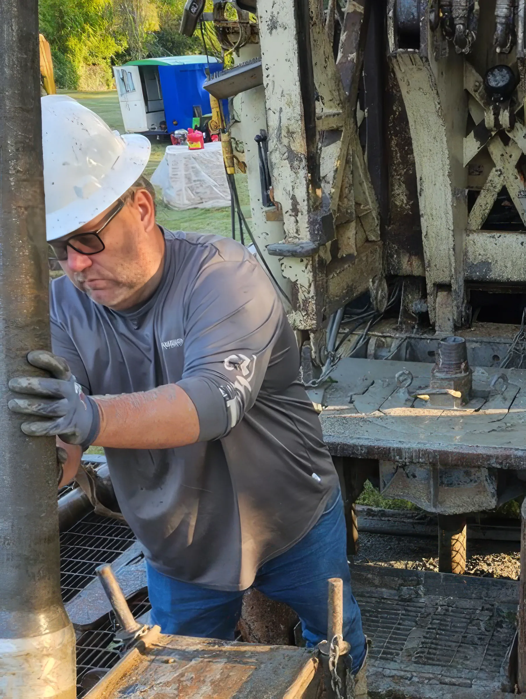 Matt Muller, owner of DFW Well Service, working on a water well drilling rig in North Texas