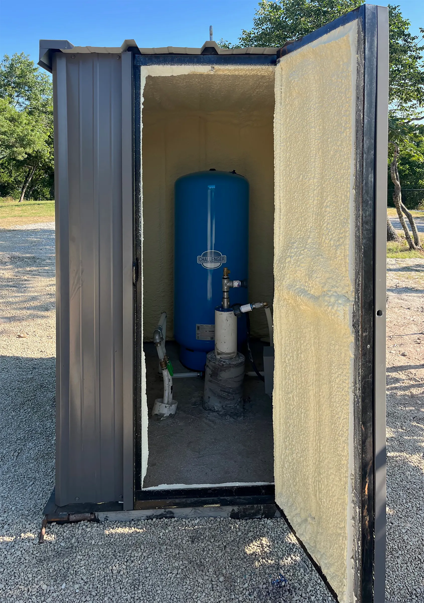 Pressure tank installed inside a well house by DFW Well Service